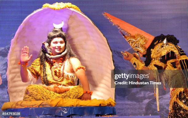 Artists perform the traditional 'Ramlila' drama narrating the life of Hindu God Rama on stage during the celebration to mark 'Dussehra' Festival...