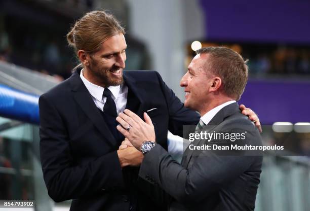 Nicolas Frutos, Interim Manager of RSC Anderlecht and Brendan Rodgers manager of Celtic speak during the UEFA Champions League group B match between...