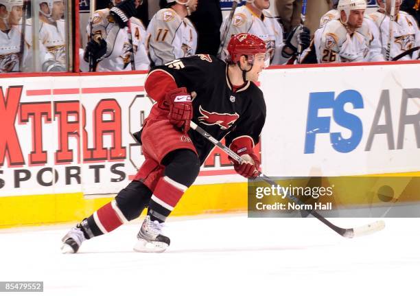 Matthew Lombardi of the Phoenix Coyotes turns up ice against the Nashville Predators on March 14, 2009 at Jobing.com Arena in Glendale, Arizona.