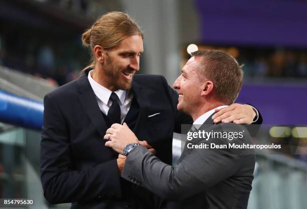 Nicolas Frutos, Interim Manager of RSC Anderlecht and Brendan Rodgers manager of Celtic speak during the UEFA Champions League group B match between...