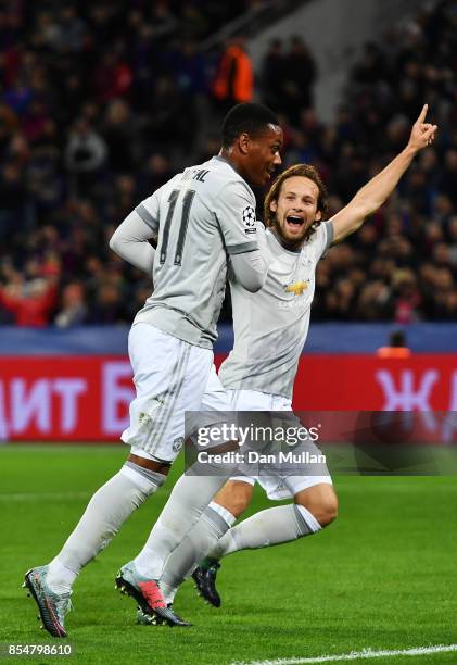 Anthony Martial of Manchester United celebrates scoring his sides second goal with Daley Blind of Manchester United during the UEFA Champions League...