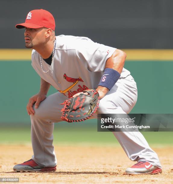 Albert Pujols of the St. Louis Cardinals fields against the Detroit Tigers during the spring training game at Joker Marchant Stadium on March 16,...