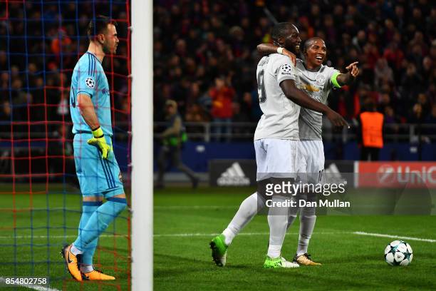 Romelu Lukaku of Manchester United celebrates with Ashley Young of Manchester United after scoring his second and his sides third goal during the...