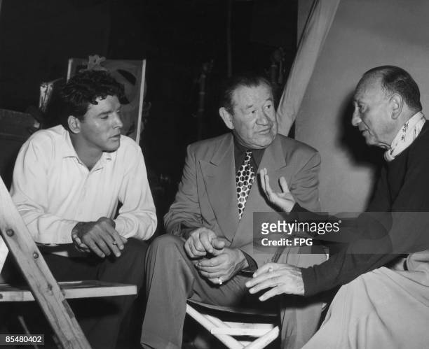 From left to right, actor Burt Lancaster , athlete Jim Thorpe and director Michael Curtiz on the set of the biopic 'Jim Thorpe - All-American' in...