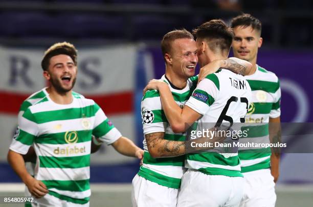 Leigh Griffiths of Celtic celebrates scoring his sides first goal with team mates during the UEFA Champions League group B match between RSC...