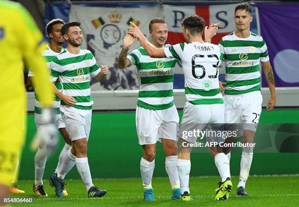 Leigh Griffiths of Celtic FC celebrates with teammates Kieran Tierney , Mikael Lustig and others after scoring during the UEFA Champions League Group...