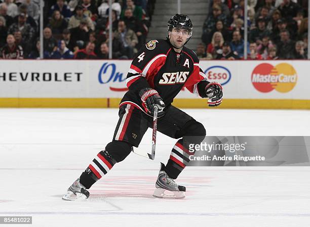Chris Phillips of the Ottawa Senators skates against the Toronto Maple Leafs at Scotiabank Place on March 9, 2009 in Ottawa, Ontario, Canada.