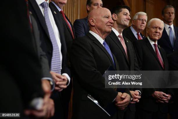 Rep. Kevin Brady , Speaker of the House Rep. Paul Ryan , Sen. Orrin Hatch , Sen. Michael Enzi and Sen. John Thune listen during a press event on tax...