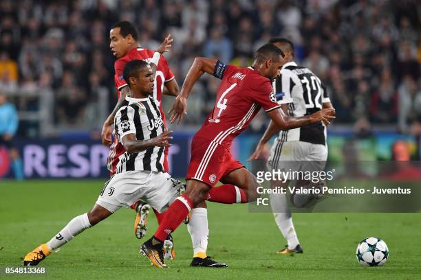 Alaixys Romao of Olympiacos in action during the UEFA Champions League group D match between Juventus and Olympiakos Piraeus at Allianz Stadium on...