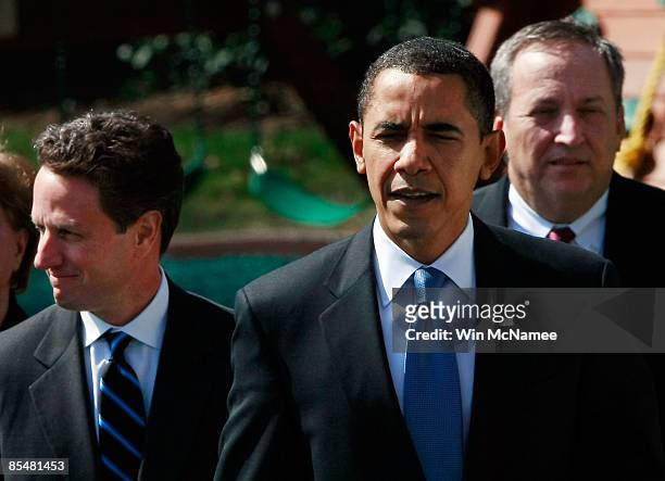 President Barack Obama walks with U.S. Treasury Secretary Timothy Geithner and Director of the White House's National Economic Council Lawrence...