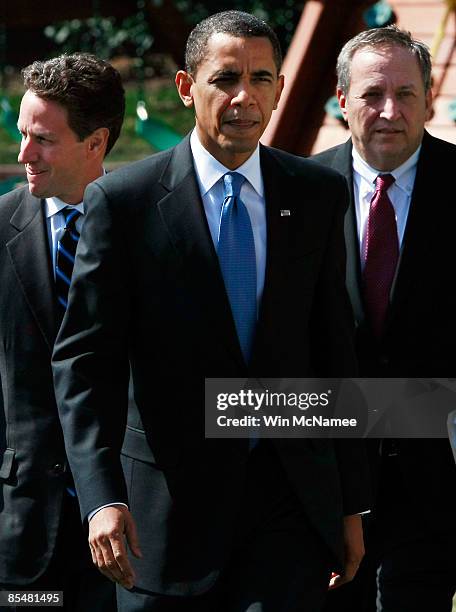 President Barack Obama walks with U.S. Treasury Secretary Timothy Geithner and Director of the White House's National Economic Council Lawrence...