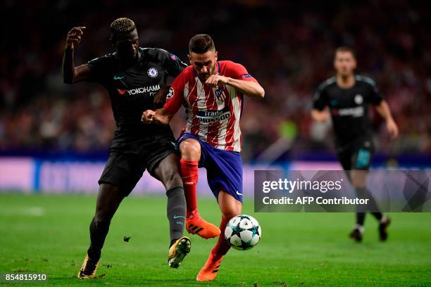 Chelsea's French midfielder Tiemoue Bakayoko vies with Atletico Madrid's midfielder Koke during the UEFA Champions League Group C football match Club...