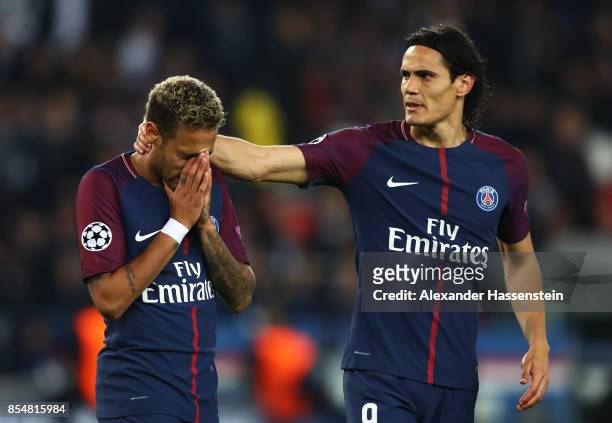 Neymar of PSG and Edinson Cavani of PSG react during the UEFA Champions League group B match between Paris Saint-Germain and Bayern Muenchen at Parc...