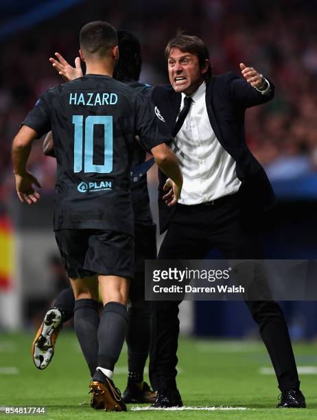 Antonio Conte, Manager of Chelsea celebrates after Chelsea score their first goal during the UEFA Champions League group C match between Atletico...
