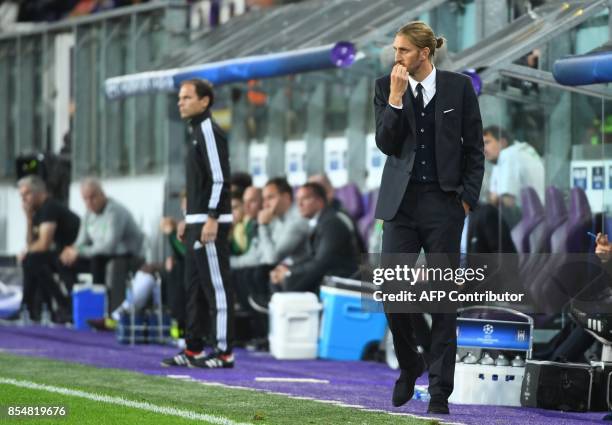 Anderlecht's coach Nicolas Frutos looks on from the touchline during the UEFA Champions League Group B football match Anderlecht vs Celtic at The...