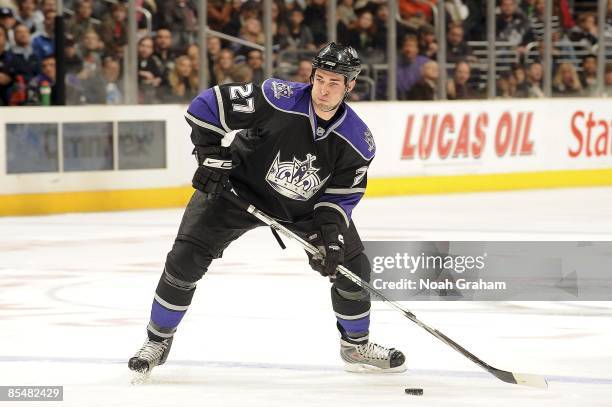Kyle Quincey of the Los Angeles Kings passes the puck against the Nashville Predators during the game on March 16, 2009 at Staples Center in Los...