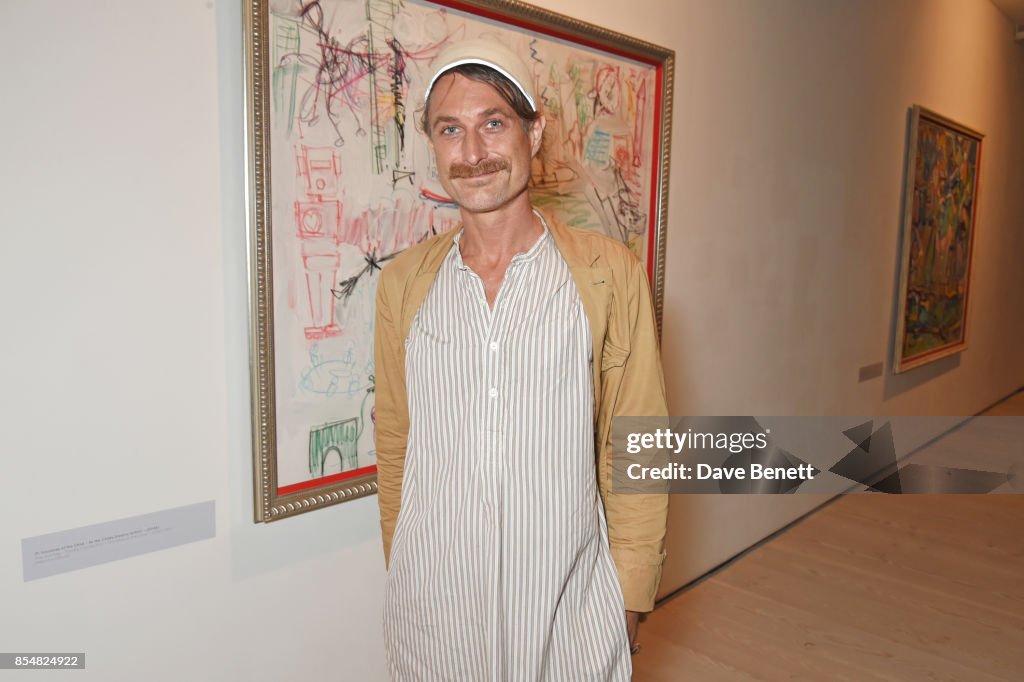 Carter Healy attends the private view and launch of Sacha Jafri's 18