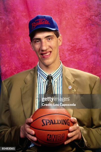 Gheorge Muresan, selected number thirty overall by the Washington Bullets poses for a portrait during the 1993 NBA Draft on June 30, 1993 at the...