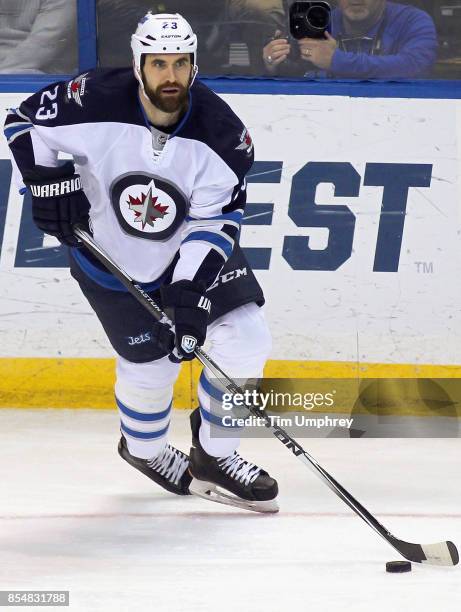 Jay Harrison of the Winnipeg Jets plays in the game against the St. Louis Blues at the Scottrade Center on April 7, 2015 in St. Louis, Missouri.