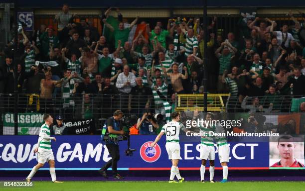 Scott Sinclair of Celtic celebrates with team mates after scoring his sides third goal during the UEFA Champions League group B match between RSC...