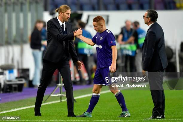 Nicolas Frutos head coach of RSC Anderlecht and Adrien Trebel midfielder of RSC Anderlecht look dejected on the final whistle after the defeat during...