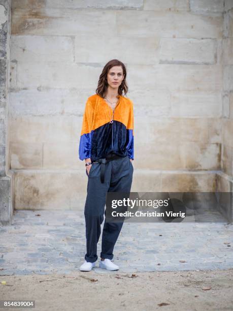 Aymeline Valade wearing velvet jacket is seen outside Lacoste during Paris Fashion Week Spring/Summer 2018 on September 27, 2017 in Paris, France.