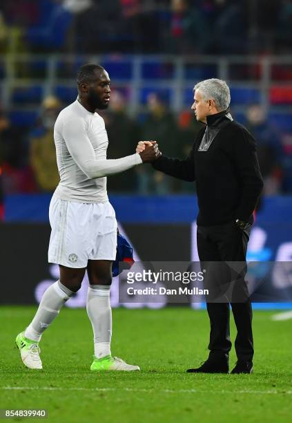 Romelu Lukaku of Manchester United and Jose Mourinho, Manager of Manchester United shake hands following victory during the UEFA Champions League...