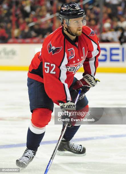 Mike Green of the Washington Capitals plays in the game against the Boston Bruins at Verizon Center on April 8, 2015 in Washington, DC.