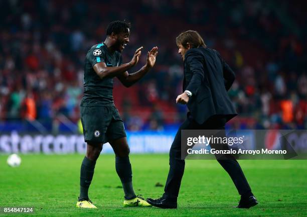 Michy Batshuayi of Chelsea and Antonio Conte, Manager of Chelsea celebrate victory during the UEFA Champions League group C match between Atletico...