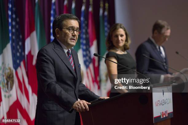 Ildefonso Guajardo Villarreal, Mexico's secretary of economy, left, speaks while Chrystia Freeland, Canada's minister of foreign affairs, center,...