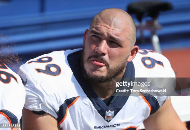 Adam Gotsis of the Denver Broncos looks on from the bench during NFL game action against the Buffalo Bills at New Era Field on September 24, 2017 in...