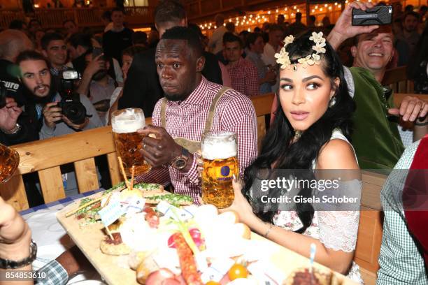 Usain Bolt, sprinter, eightfold olympic champion and elevenfold world champion at Schuetzen-Festzelt during the Oktoberfest at Theresienwiese on...