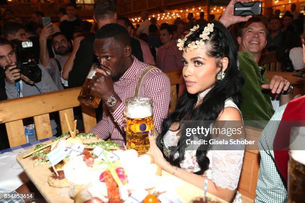 Usain Bolt, sprinter, eightfold olympic champion and elevenfold world champion at Schuetzen-Festzelt during the Oktoberfest at Theresienwiese on...