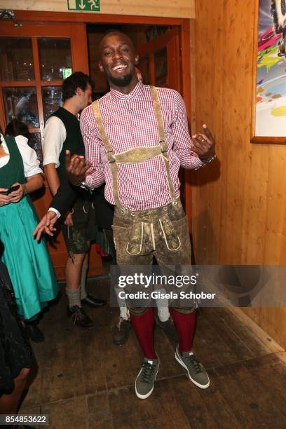 Usain Bolt, sprinter, eightfold olympic champion and elevenfold world champion at Schuetzen-Festzelt during the Oktoberfest at Theresienwiese on...