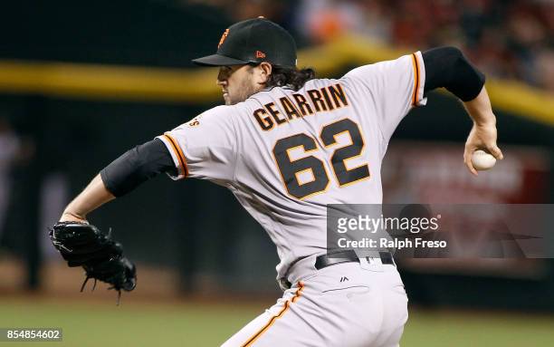 Cory Gearrin of the San Francisco Giants throws a pitch against the Arizona Diamondbacks during the eighth inning of a MLB game at Chase Field on...