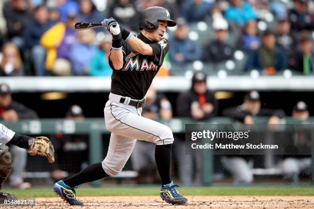 Ichiro Suzuki of the Miami Marlins gorunds out in the fourth inning against the Colorado Rockies at Coors Field on September 27, 2017 in Denver,...