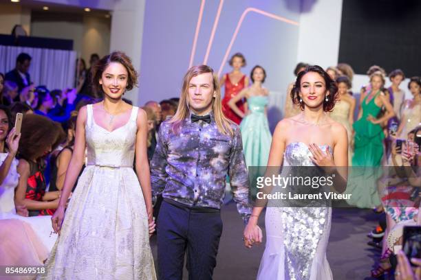Patricia Contreras, Christophe Guillarme and Delphine Wespiser walk the runway during the Christophe Guillarme show as part of the Paris Fashion Week...