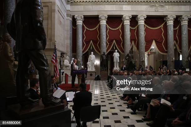 Former U.S. Senate Majority Leader Tom Daschle participates in a reading during a memorial service at the National Statuary Hall of the Capitol...