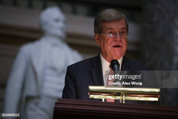 Former U.S. Senate Majority Leader Trent Lott participates in a reading during a memorial service at the National Statuary Hall of the Capitol...
