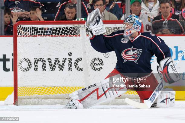 Goaltender Steve Mason of the Columbus Blue Jackets makes a save on a Chicago Blackhawks shot during the first period at Nationwide Arena March 18,...
