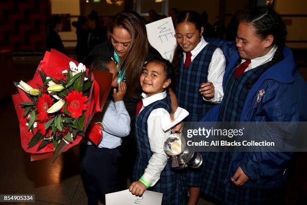 Black Ferns captain Fiao'o Fa'amusili arrives with the trophy for the New Zealand Black Ferns celebration at Vodafone Events Centre on September 28,...