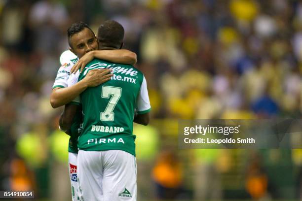 Hernan Burbano of Leon celebrates with Luis Montes after scoring the winning goal of his team during the 11th round match between Leon and America as...