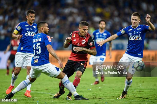 Murilo and Ezequiel of Cruzeiro struggles for the ball with Guerrero of Flamengo during a match between Cruzeiro and Flamengo as part of Copa do...