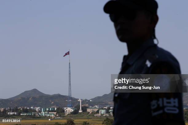 North Korean national flag in North Korea's propaganda village of Gijungdong is seen from an observation post on September 28, 2017 in Panmunjom,...