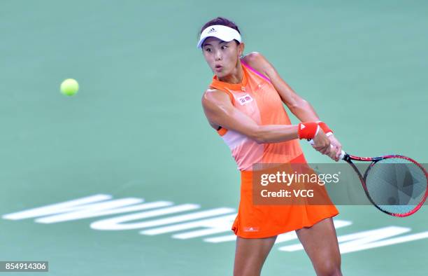 Wang Qiang of China returns a shot during the third round match against Karolina Pliskoba of Czech Republic on Day 4 of 2017 Dongfeng Motor Wuhan...