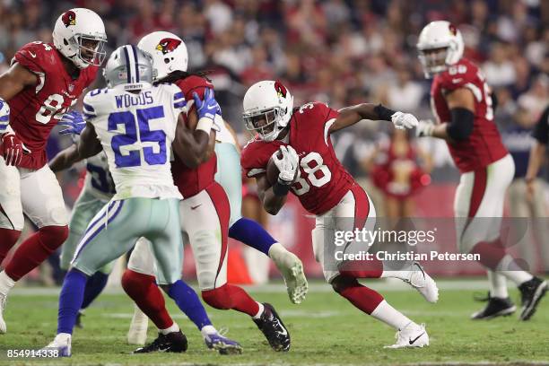 Running back Andre Ellington of the Arizona Cardinals rushes the football against the Dallas Cowboys during the NFL game at the University of Phoenix...