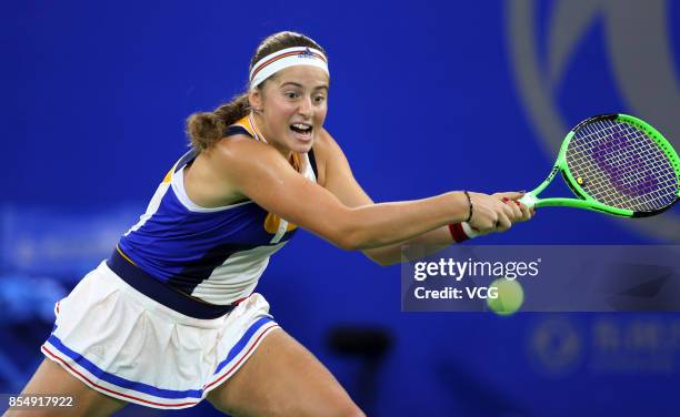 Jelena Ostapenko of Latvia returns a shot during the third round match against Monica Puig of Puerto Rico on Day 4 of 2017 Wuhan Open at Optics...