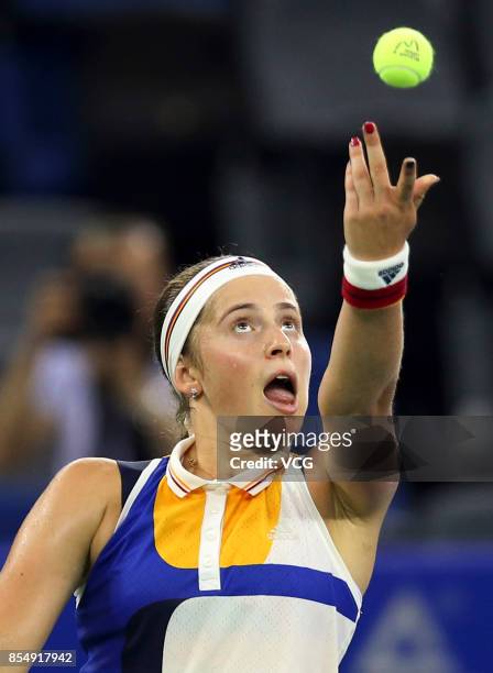 Jelena Ostapenko of Latvia serves during the third round match against Monica Puig of Puerto Rico on Day 4 of 2017 Wuhan Open at Optics Valley...