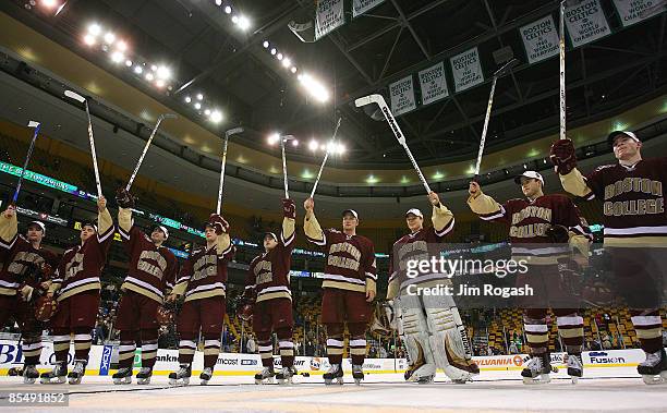 Boston College salutes the fans after defeating the University of New Hampshire for the Big East Championship, Saturday, March 17 in Boston,...