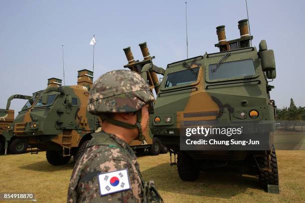 South Korean soldiers stand with Hyunmu-3 missile during the media day of the 65th South Korea Armed Forces Day ceremony on September 25, 2017 in...